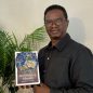 harvey-kwiyani-with-book
